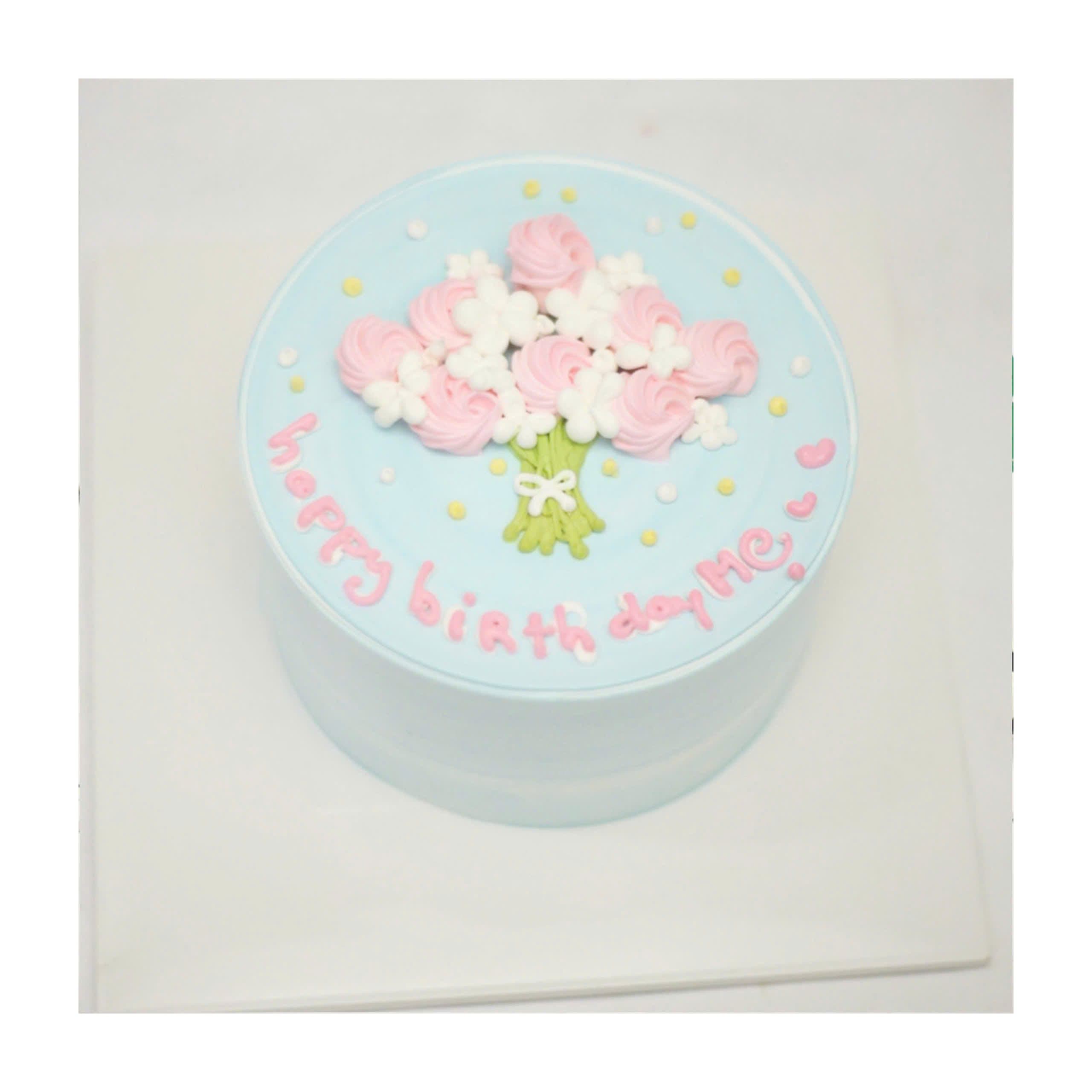 Bánh kem xanh pastel trang trí bó hoa