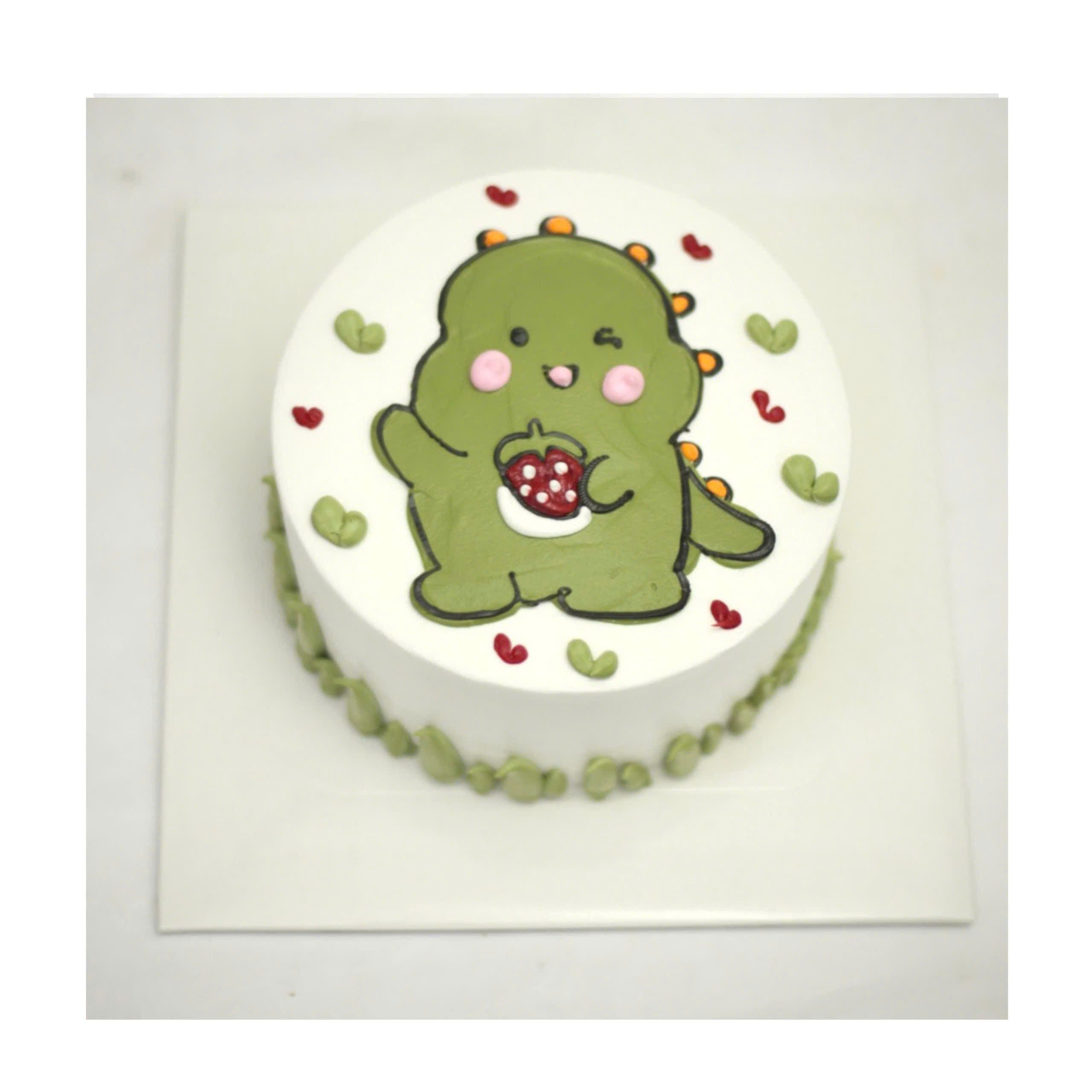 Bánh kem hình khủng long xanh ăn dâu