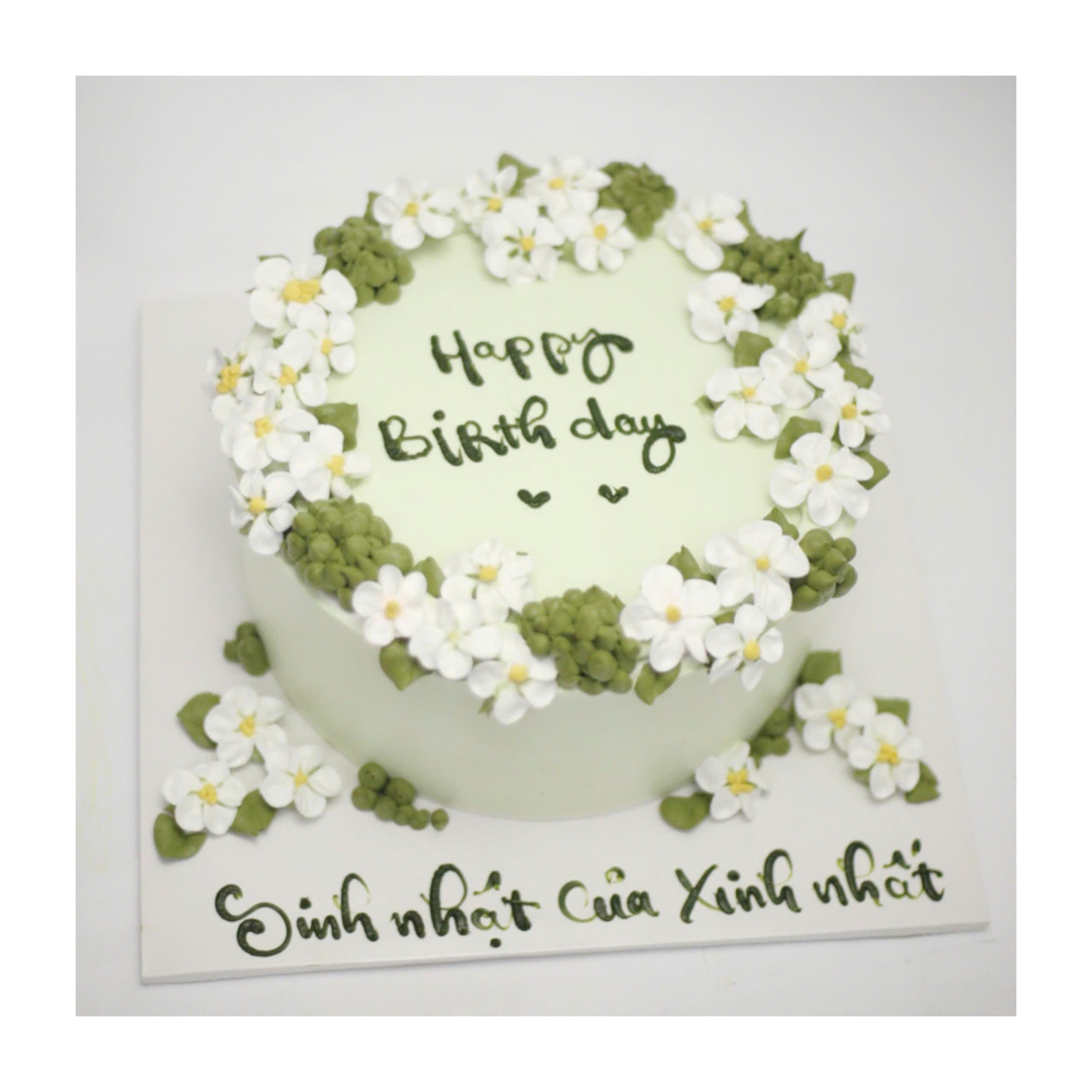 Bánh kem xanh pastel trang trí hoa trắng