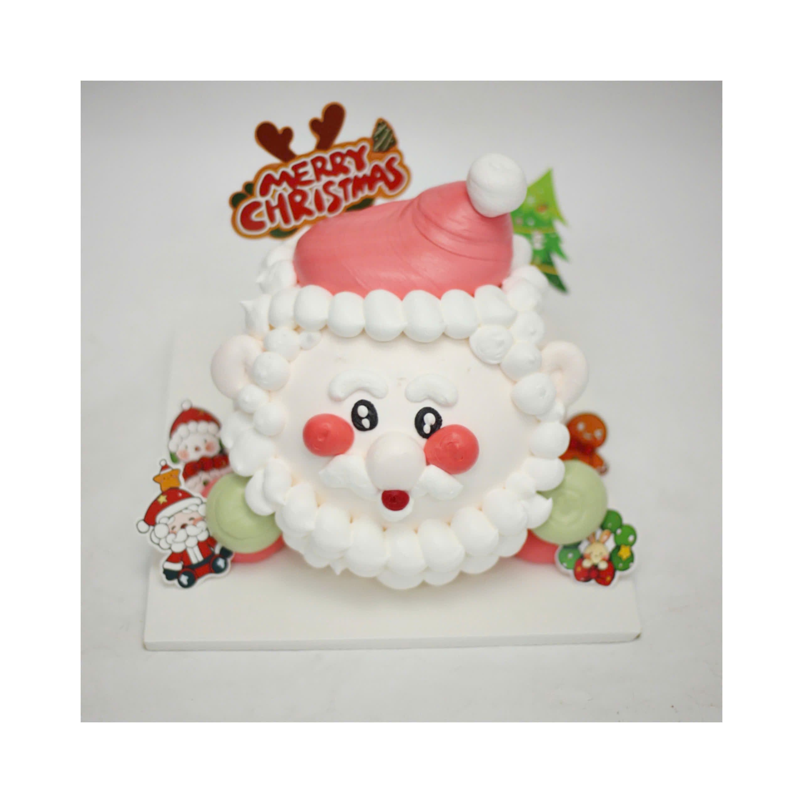 Bánh kem ông già Noel đội mũ đỏ