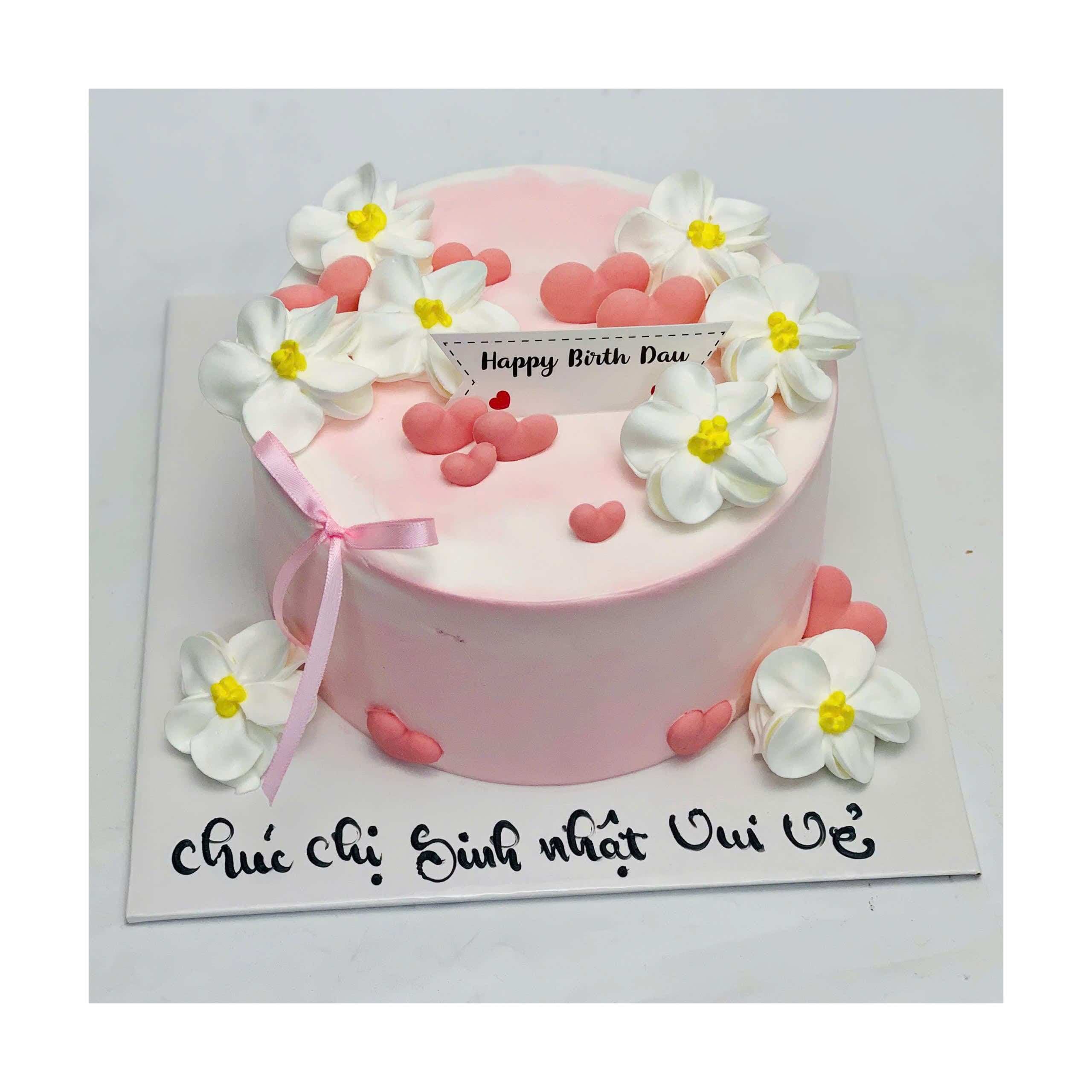 Bánh kem tone hồng pastel trang trí hoa trắng