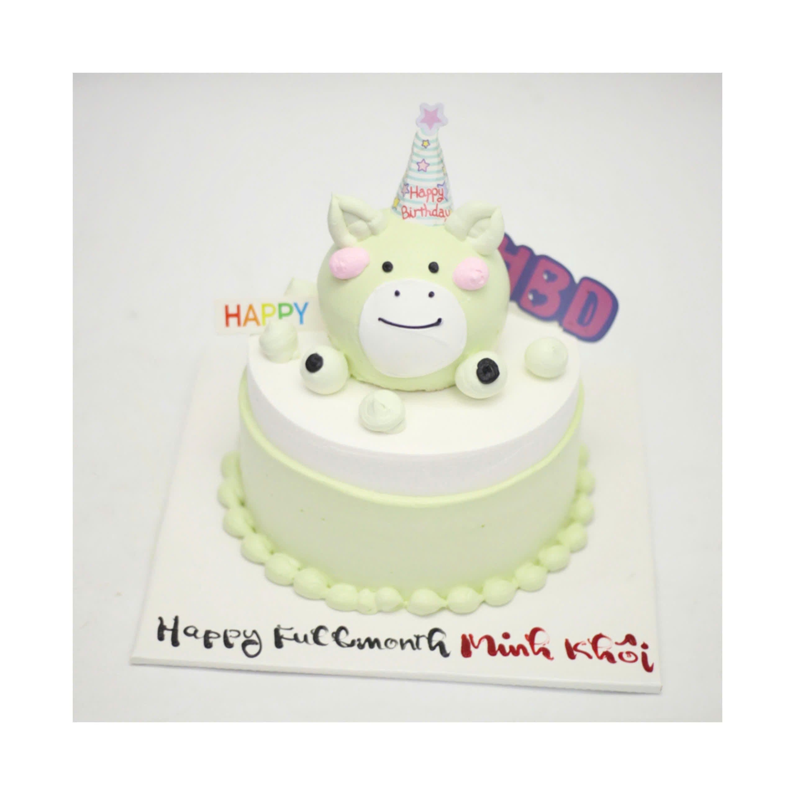 Bánh kem tạo hình heo con màu xanh