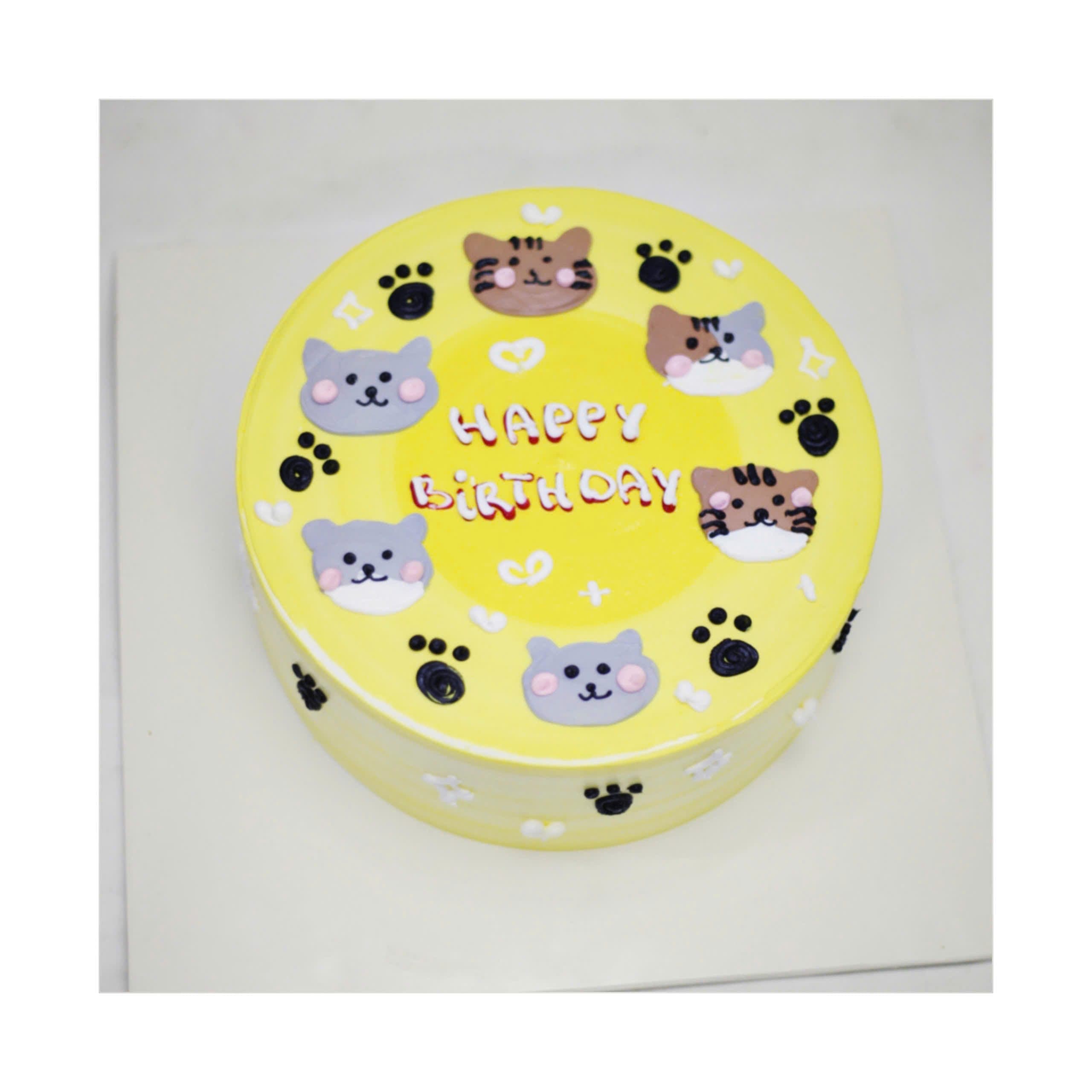 Bánh kem vàng vẽ hình nhiều mèo con