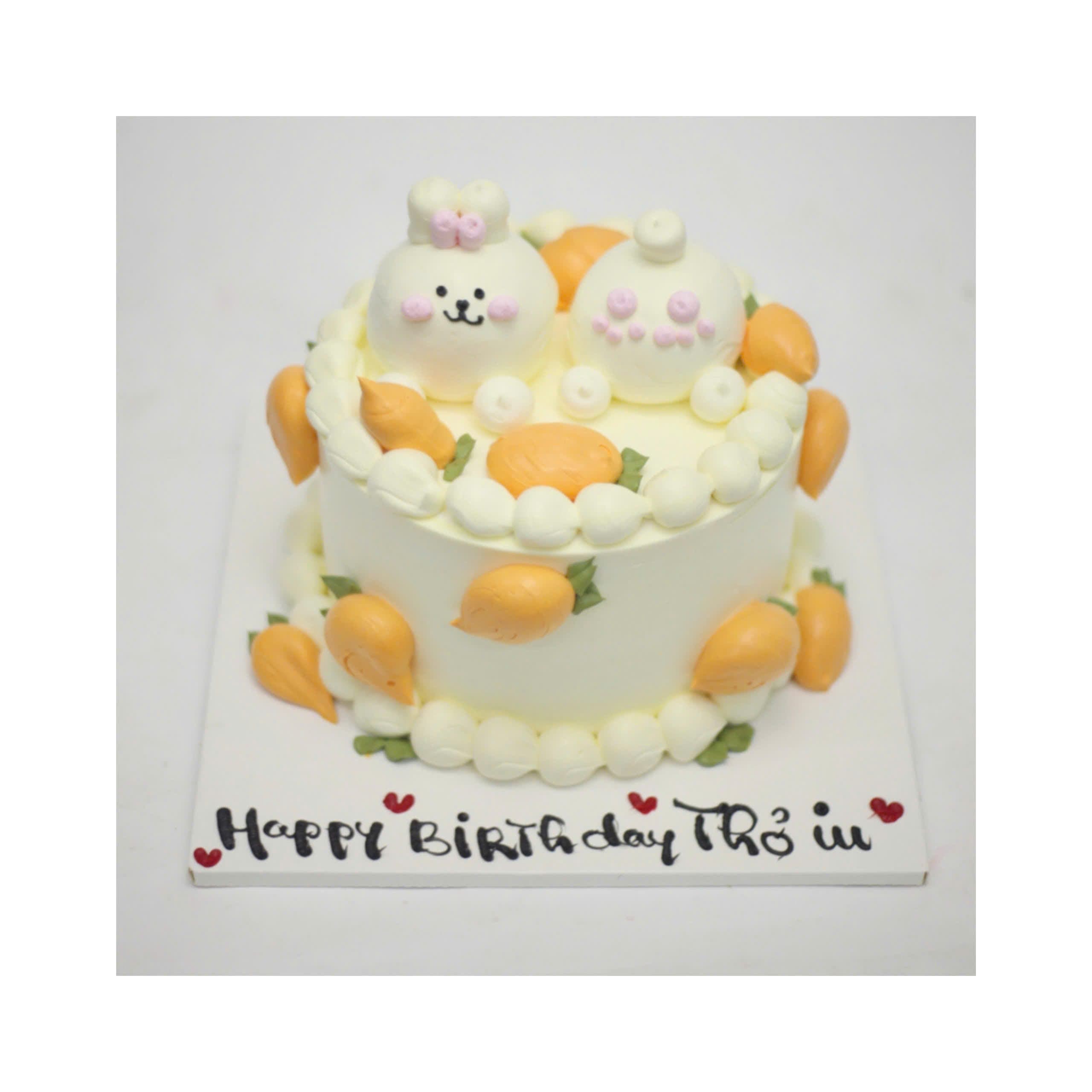 Bánh kem màu vàng trang trí chú thỏ