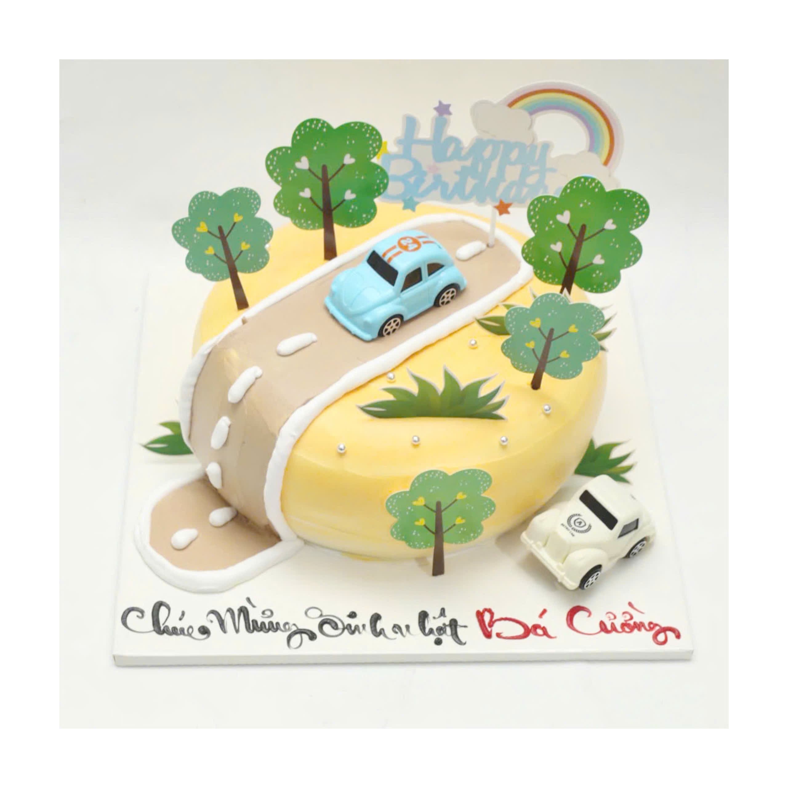 Bánh kem ô tô trên đường xanh
