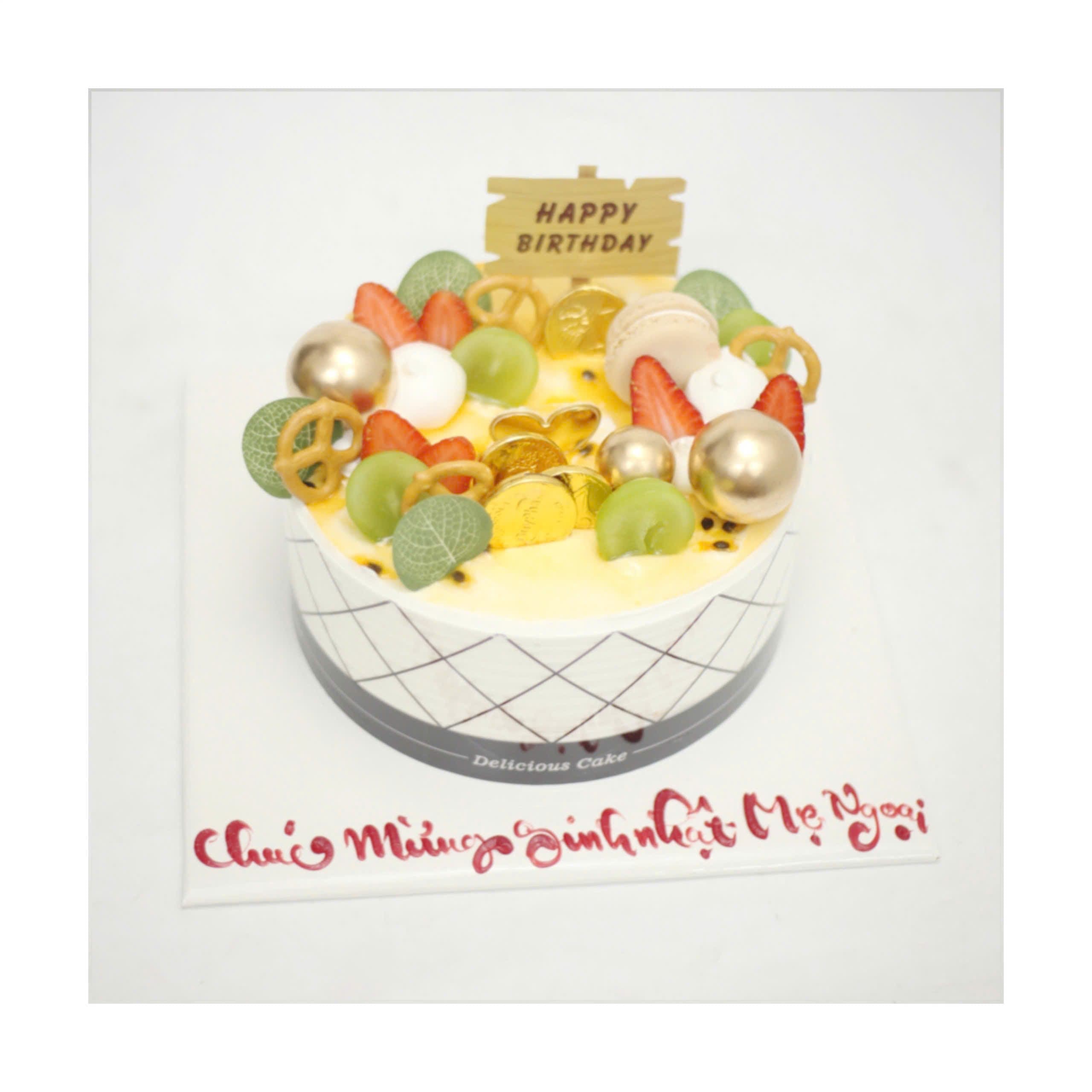 Bánh kem chanh dây trang trí trái cây và Macaron