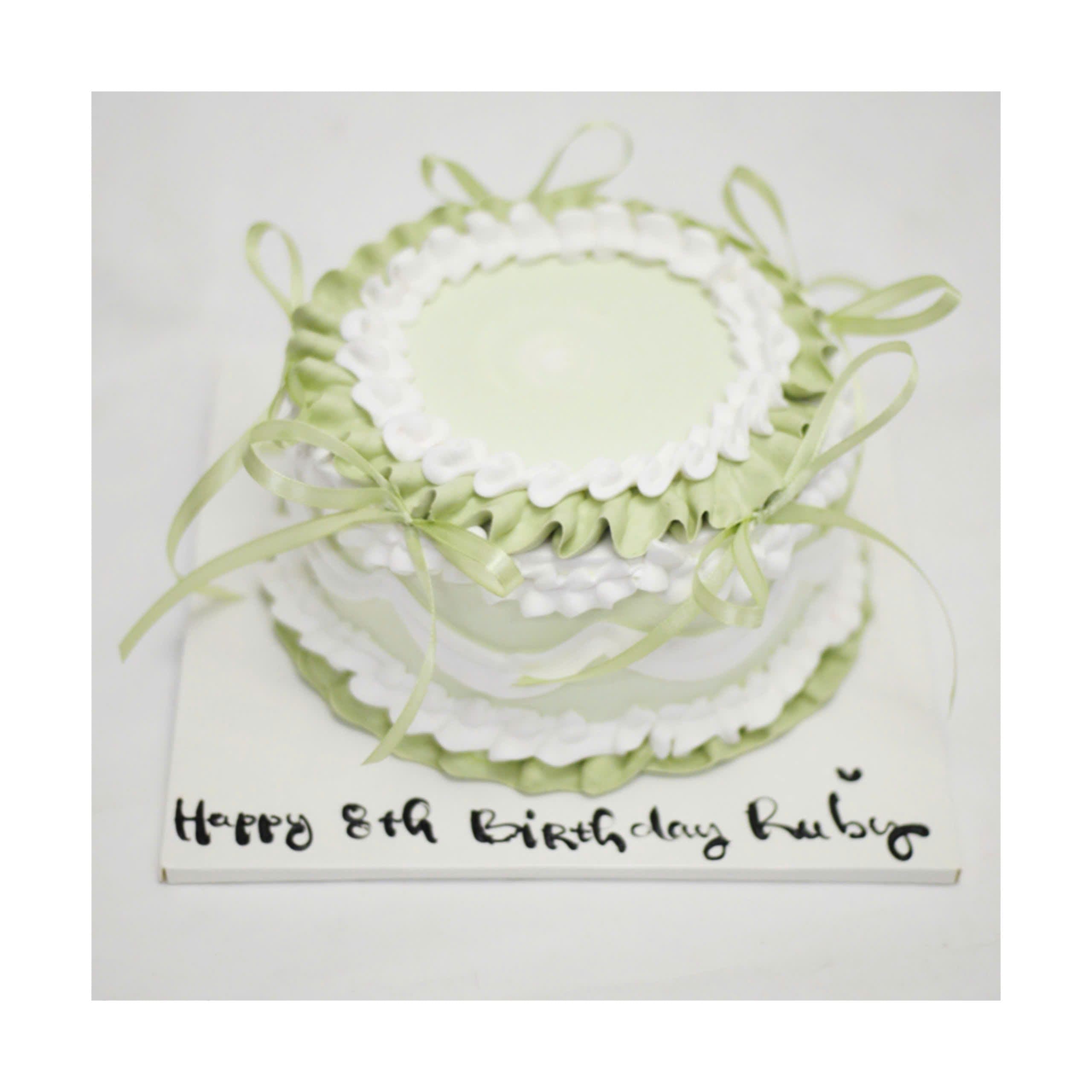 Bánh kem tone xanh lá thắt nơ lụa