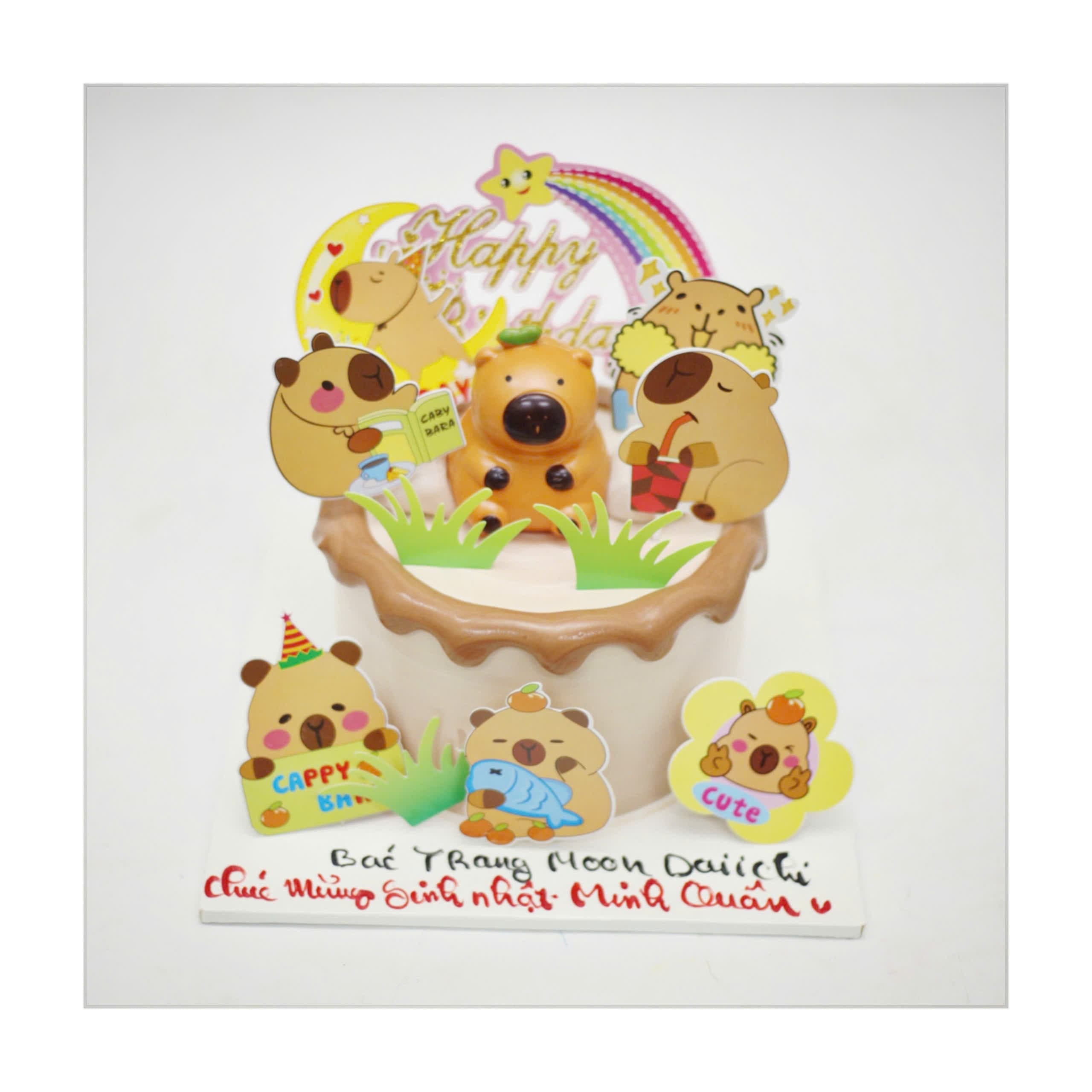 Bánh kem Capybara nâu trang trí cỏ xanh