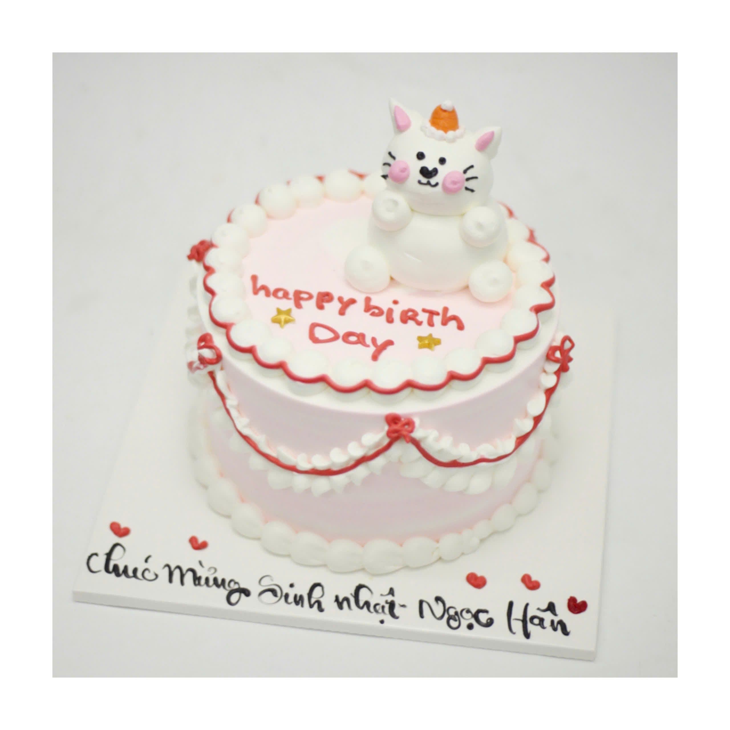 Bánh kem mèo trắng trang trí tông hồng pastel