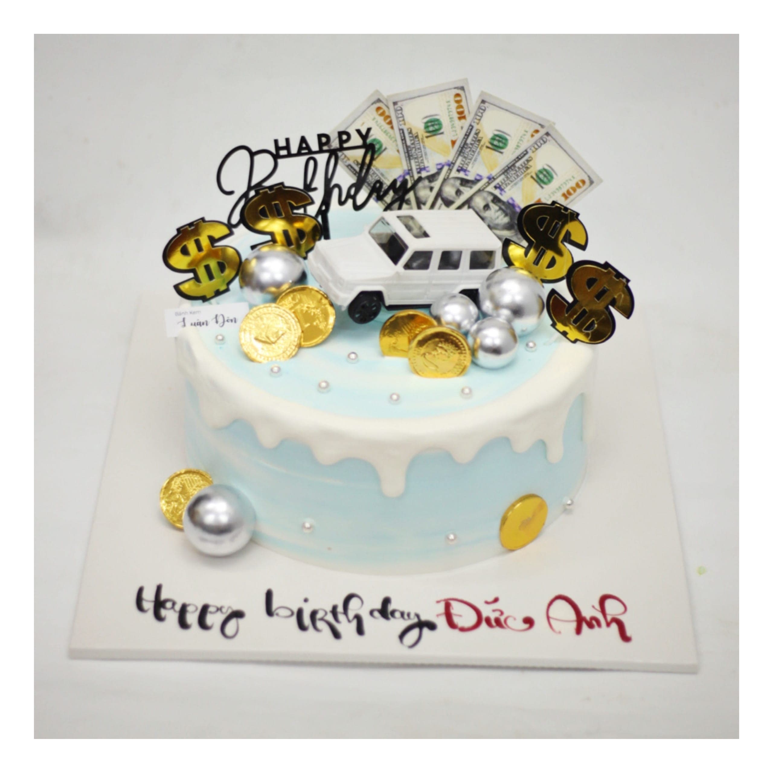 Bánh kem chủ đề tiền đô la và xe sang
