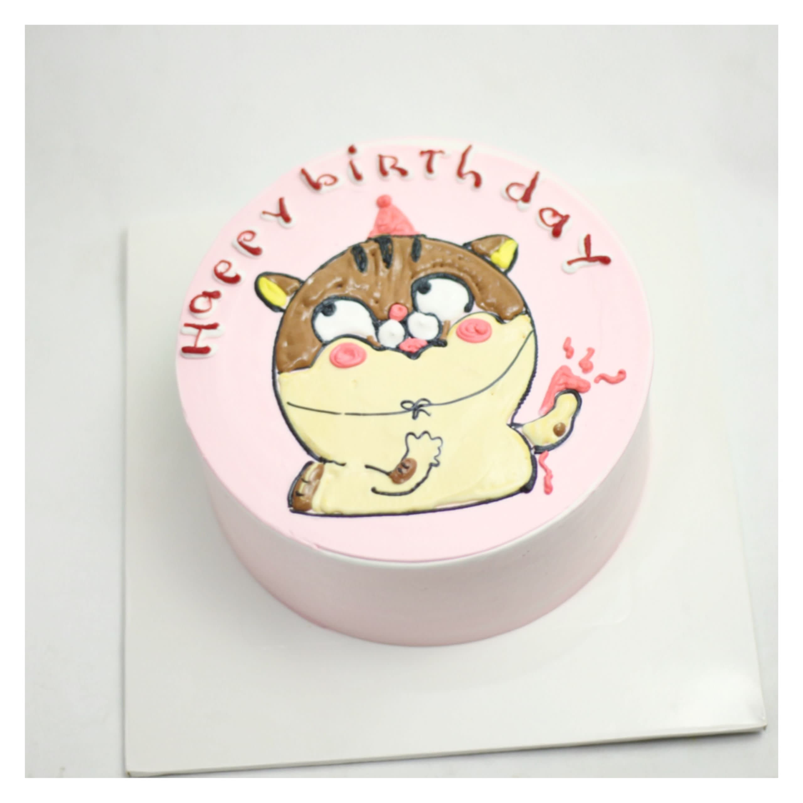 Bánh kem vẽ hình mèo tròn trịa đáng yêu