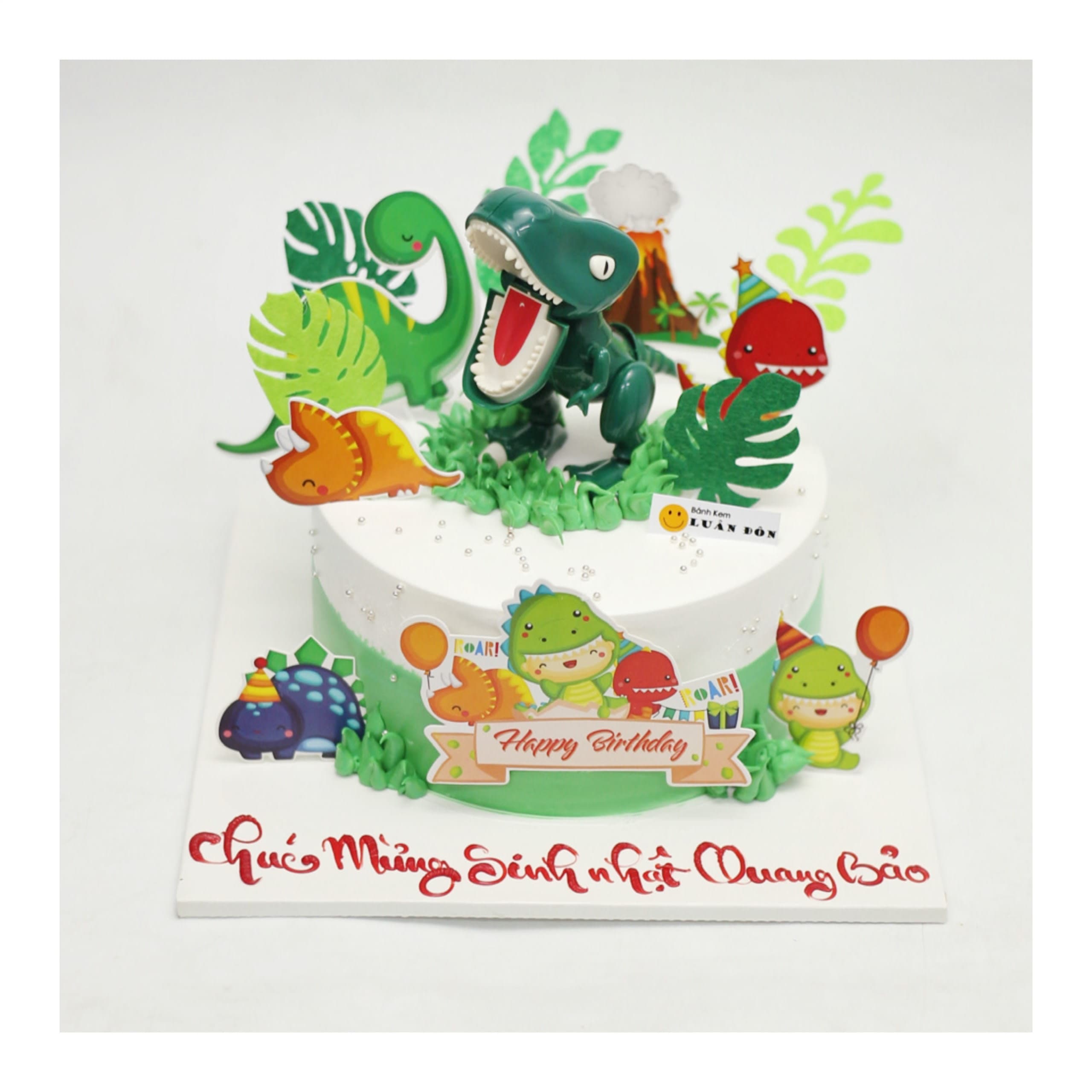 Bánh kem trắng xanh chủ đề khủng long đáng yêu