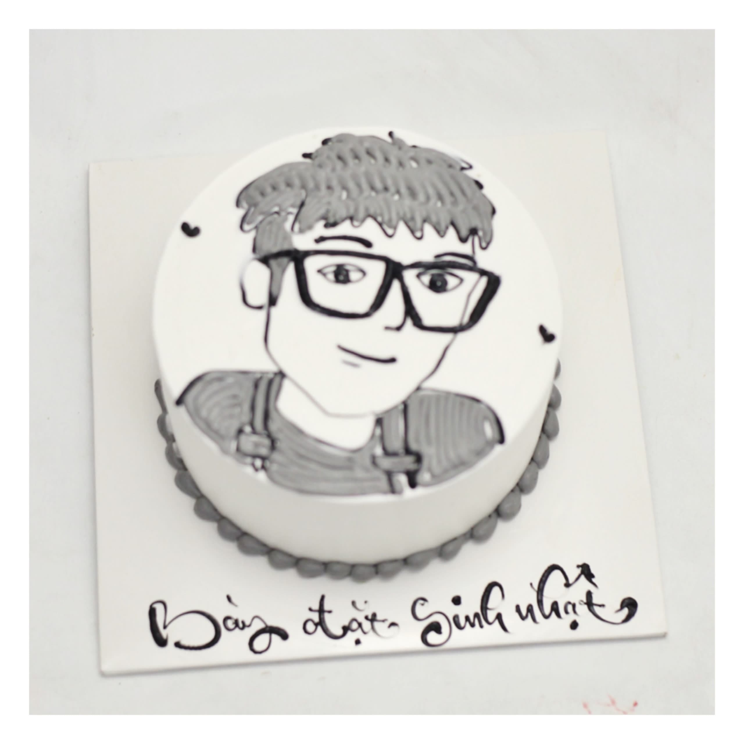 Bánh kem vẽ chân dung chibi đeo kính