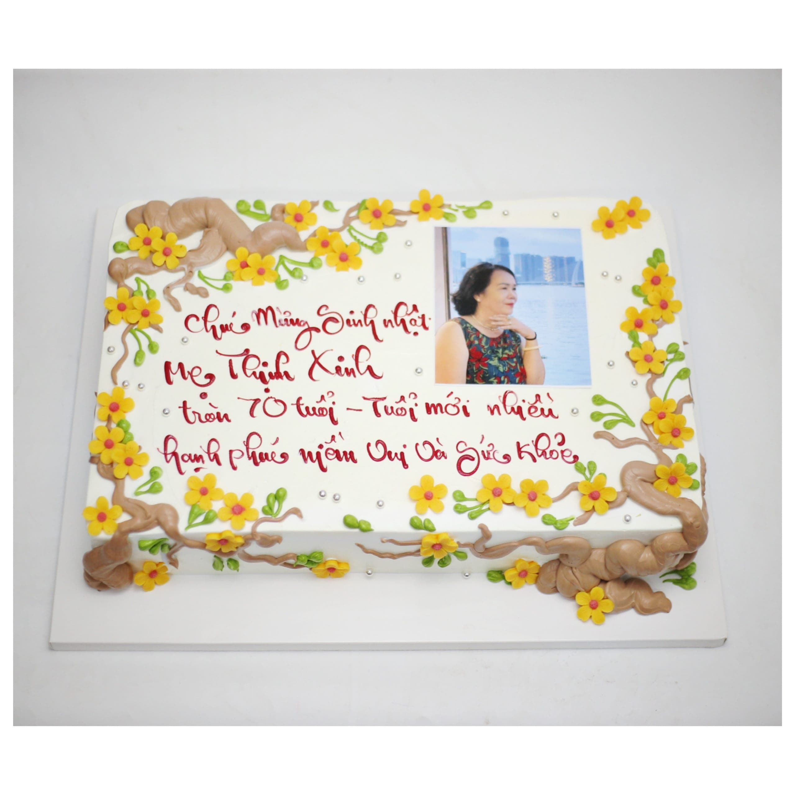 Bánh kem in ảnh hoa mai vàng mừng thọ