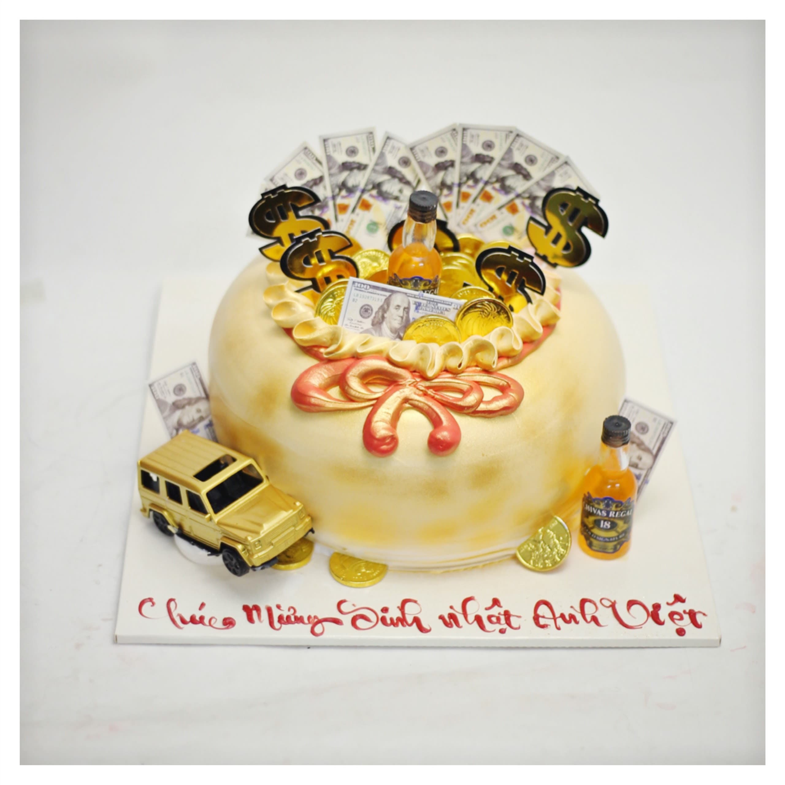 Bánh kem chủ đề tiền vàng và xe hơi