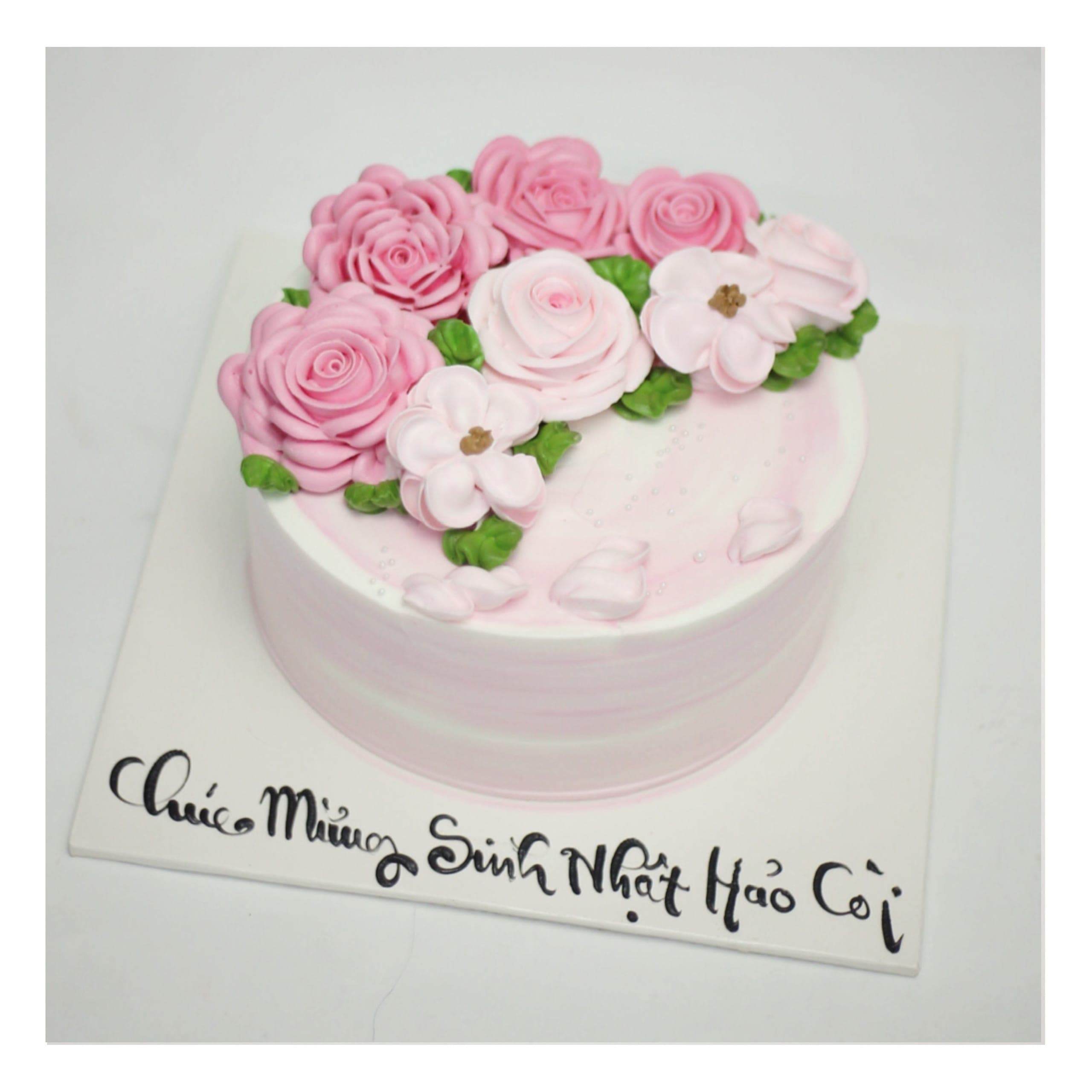 Bánh kem hồng trang trí hoa hồng kem