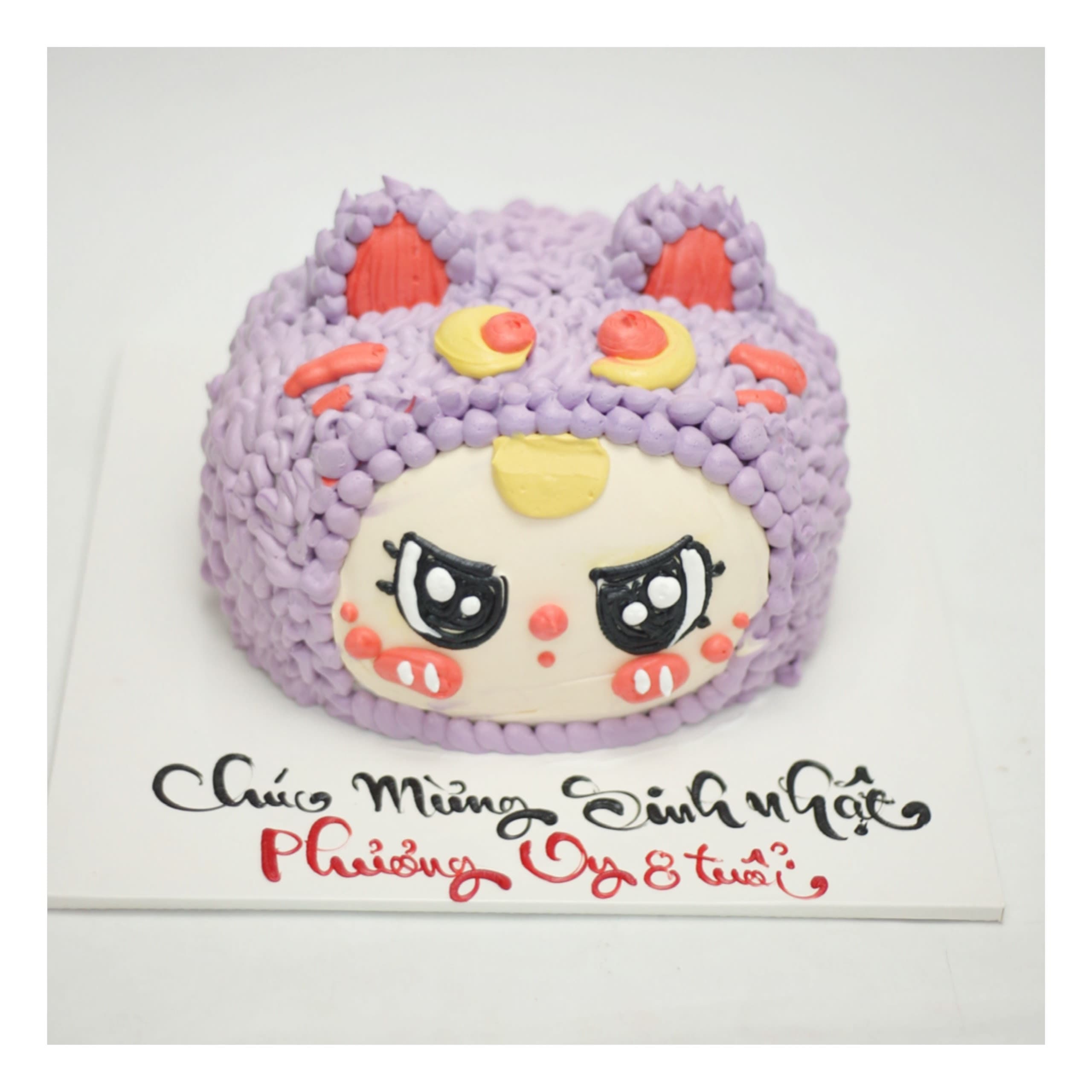 Bánh kem tạo hình nhân vật hoạt hình tím ngộ nghĩnh