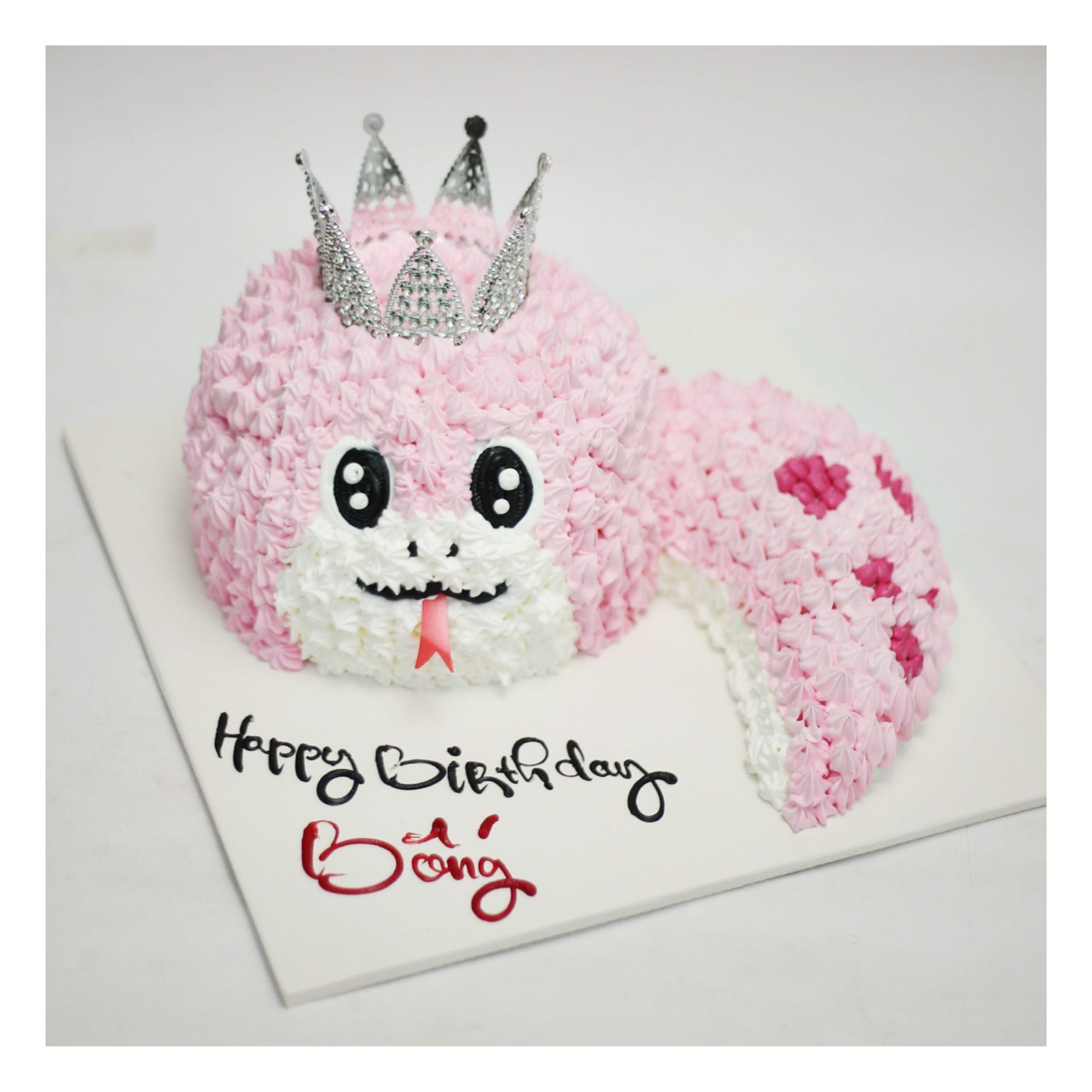 Bánh kem hình rắn hồng hoạt hình