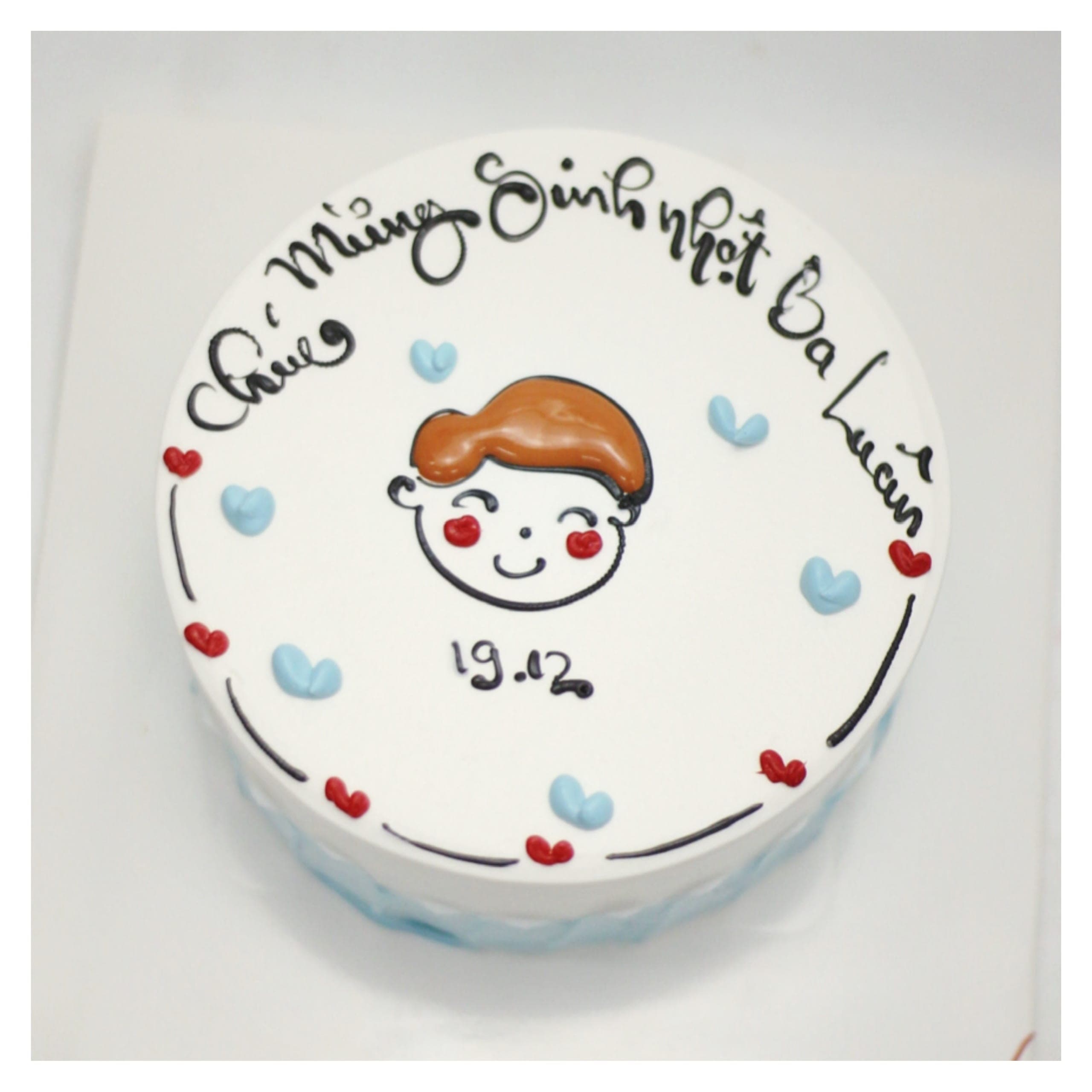 Bánh kem vẽ hình bé trai đáng yêu