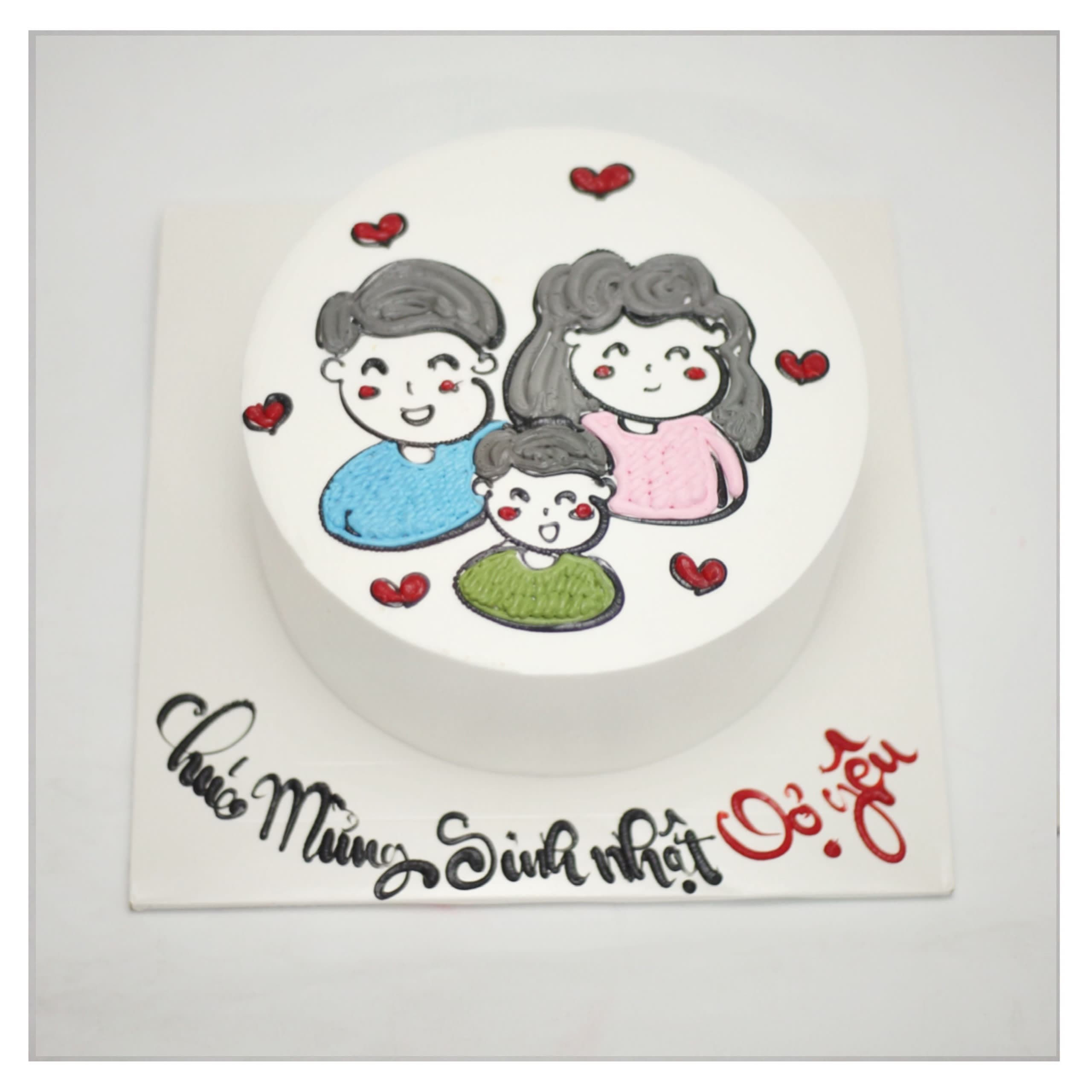 Bánh kem vẽ hình gia đình ba người hạnh phúc